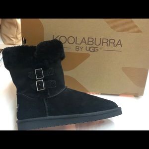 New black boots by UGG